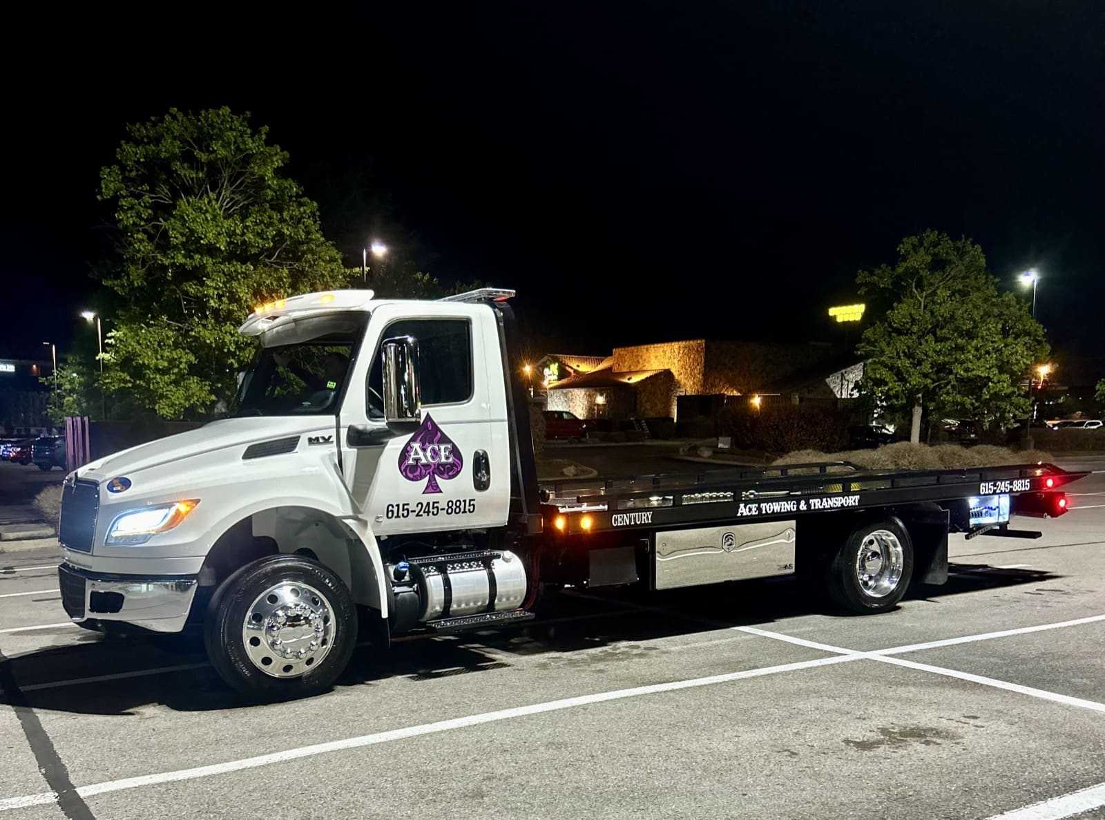 Ace Towing Tow Truck at night